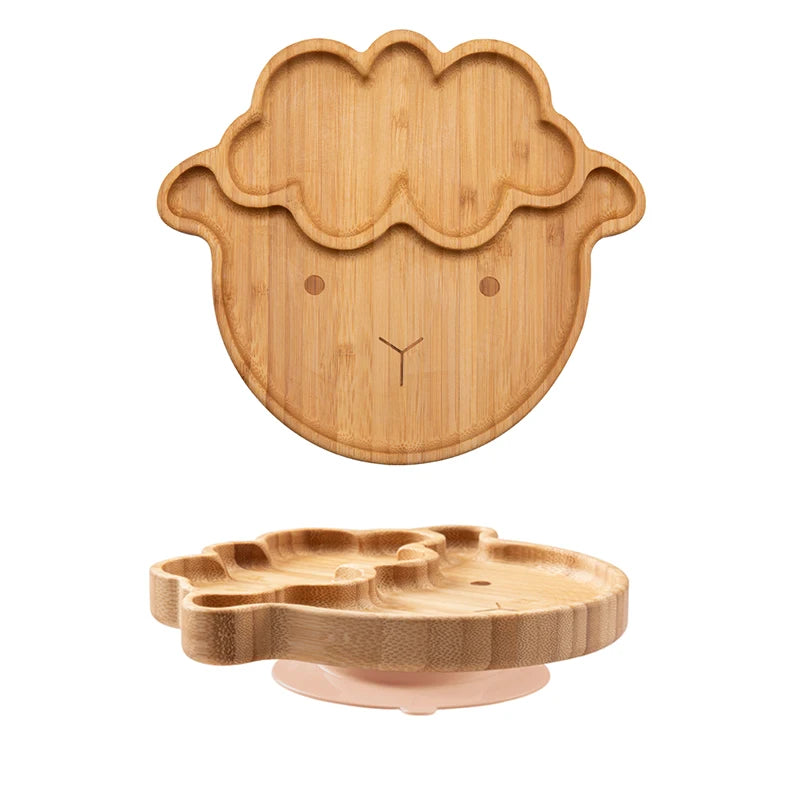 Bamboo baby plate designed in the shape of a sheep's face, featuring divided sections and a suction base for stability, ideal for toddler meals and baby-led weaning.