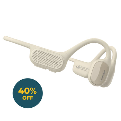 Beige open-ear bone conduction headphones.