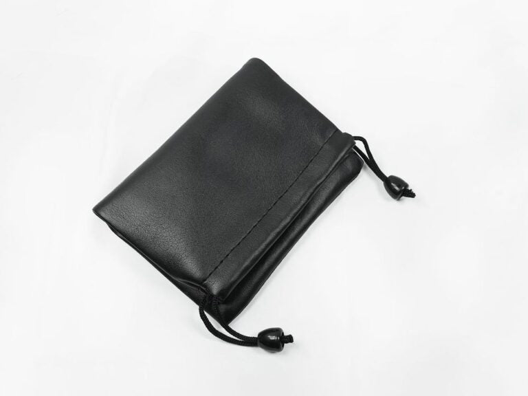 A drawstring pouch storage bag for open-ear bone conduction headphones.