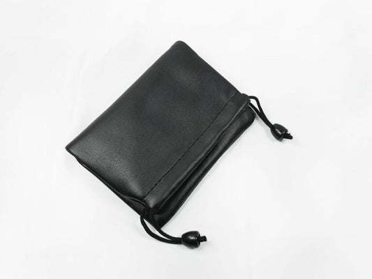 A drawstring pouch storage bag for open-ear bone conduction headphones.