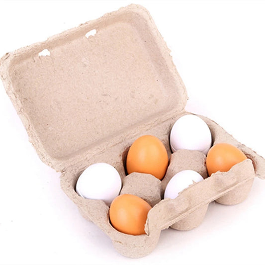 A biodegradable egg carton containing six eggs, with three white and three brown eggs placed alternately.