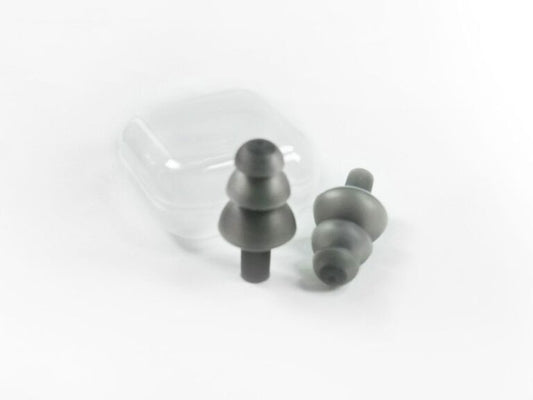 A transparent storage case for silicone earplugs.