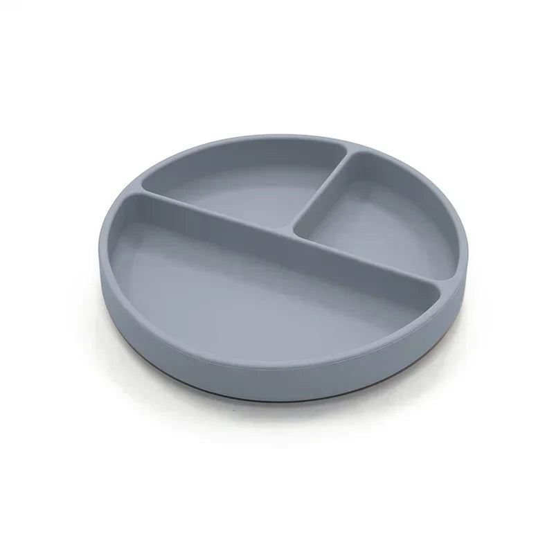 Slate blue silicone divided plate with three compartments, designed for toddler meals, portion control, and easy cleaning, perfect for baby-led weaning and independent eating.